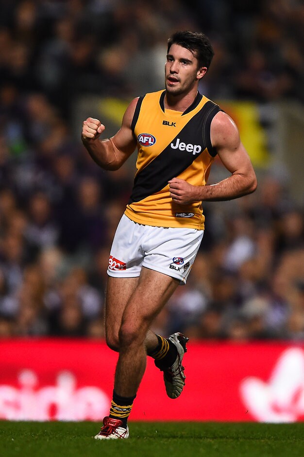 AFL 2015 Rd 10 - Fremantle v Richmond PERTH, AUSTRALIA - JUNE 06: Corey Ellis of the Richmond Tigers celebrates a goal during the 2015 AFL Round 10 match between the Fremantle Dockers and the Richmond Tigers at Domain Stadium, Perth on June 5, 2015. (Photo by Daniel Carson/AFL Media)